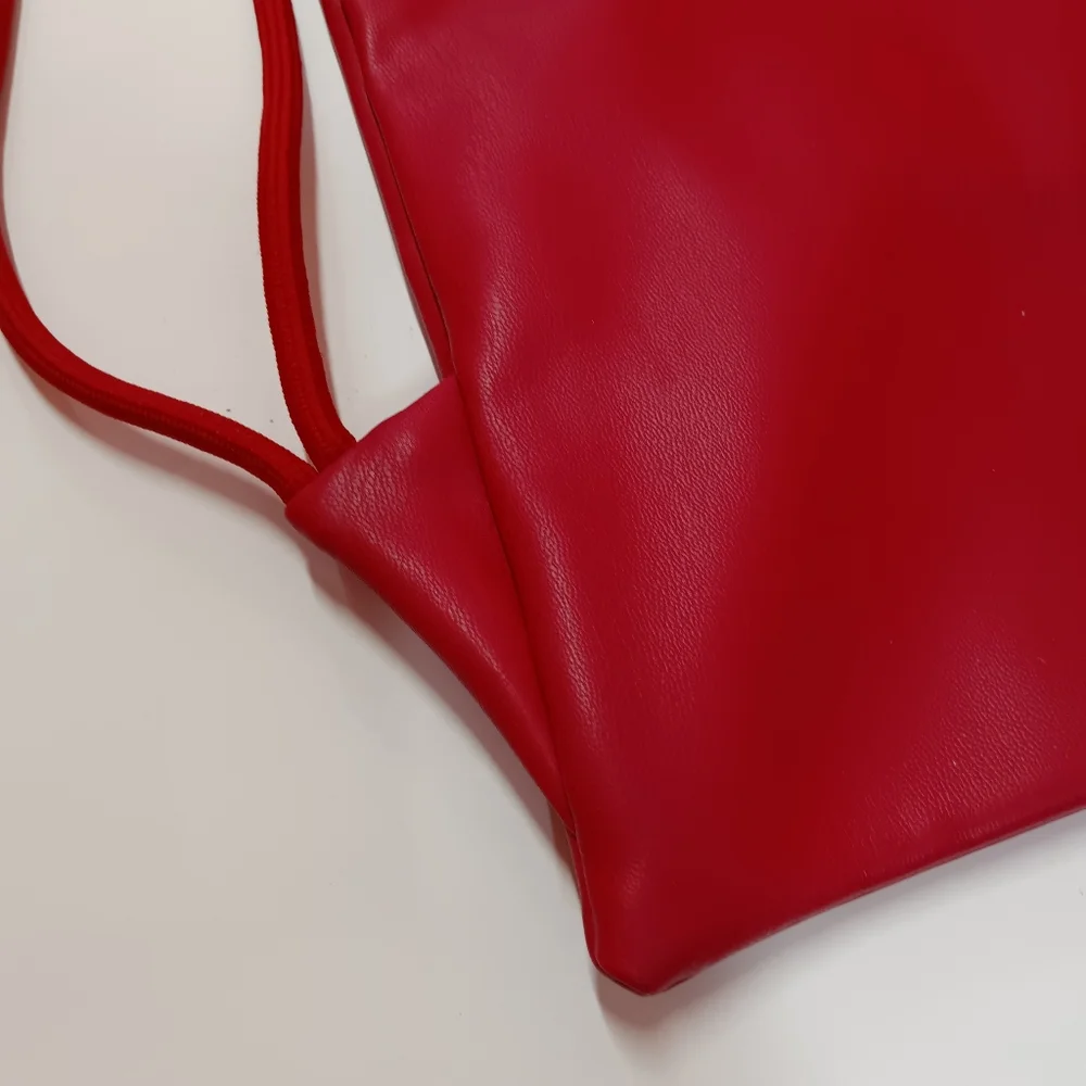 JORDAN Red Faux Leather Drawstring Backpack with Gold Jumpman